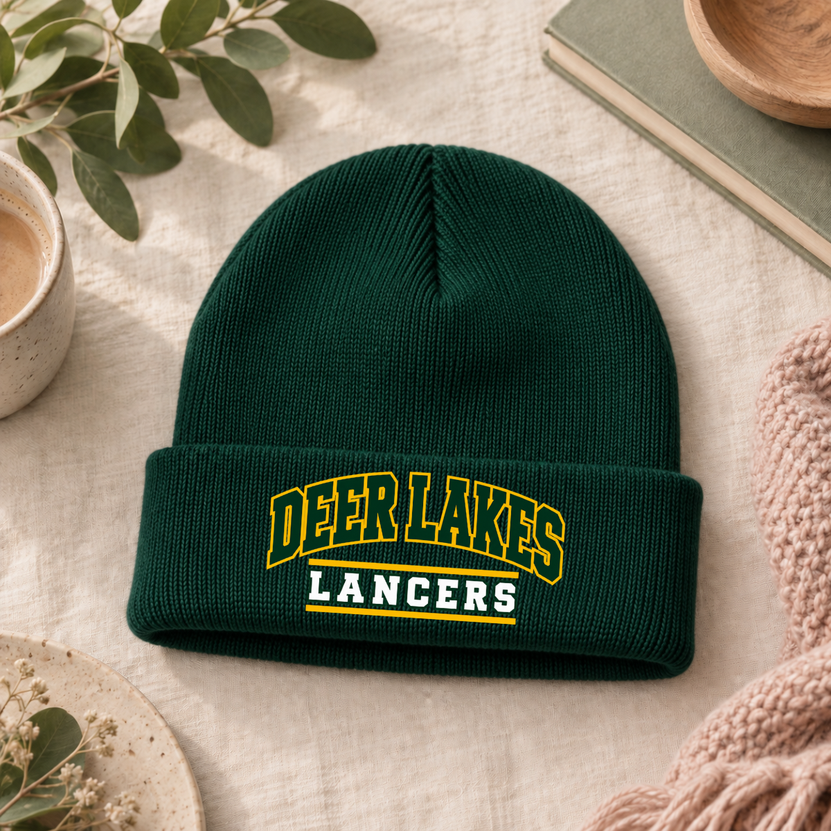 Deer Lakes Lancers Arch Beanie Dark green Deer Lakes Lancers knit beanie with gold and white arched school spirit design